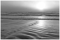 Foggy sunset over the ocean. Morro Bay, USA ( black and white)
