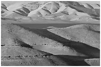 Hills in summer and San Luis Reservoir. California, USA (black and white)