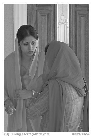 Indian woman in sari, Sikh Gurdwara Temple. San Jose, California, USA (black and white)