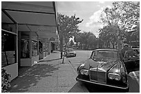 Goodwill store and Rolls-Royce on  Santa Cruz avenue. Menlo Park,  California, USA ( black and white)