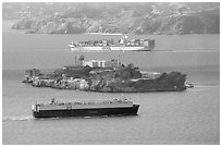 Cargo ships and Alcatraz Island in the San Francisco Bay. San Francisco, California, USA (black and white)