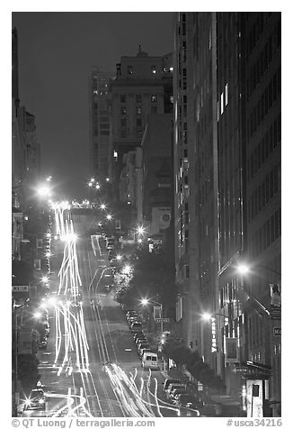 Steep California street and lights at night. San Francisco, California, USA (black and white)