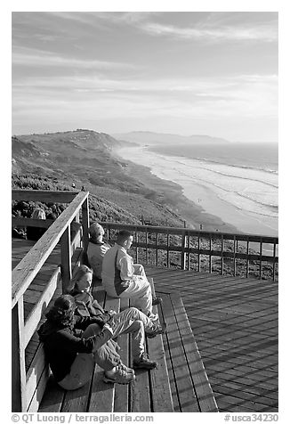 Enjoying sunset from the observation platform at Fort Funston. San Francisco, California, USA (black and white)