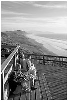 Enjoying sunset from the observation platform at Fort Funston. San Francisco, California, USA (black and white)