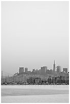 Sausalito houseboats and San Francisco skyline, sunset. San Francisco, California, USA (black and white)