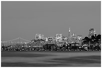 Sausalito houseboats and San Francisco skyline at night. San Francisco, California, USA (black and white)