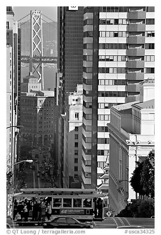 Cable-car, Chinatown, Financial District and Bay Bridge. San Francisco, California, USA (black and white)