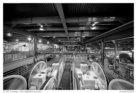 Wide inside view of historic cable car barn. San Francisco, California, USA (black and white)