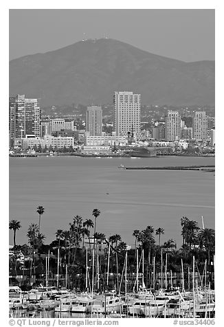 Yachts, skyline, and San Miguel Mountain, dusk. San Diego, California, USA (black and white)