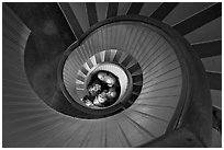 Children standing at the bottom of stairwell, Point Loma Lighthous. San Diego, California, USA (black and white)