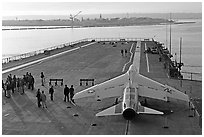 Plane in position at catapult, USS Midway aircraft carrier. San Diego, California, USA (black and white)