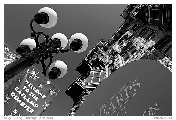 Gaslamp, welcome to Gaslamp quarter signs, and historical building facade. San Diego, California, USA (black and white)