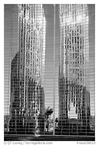 Bell tower reflected in Crystal Cathedral Facade. Garden Grove, Orange County, California, USA (black and white)