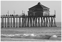 Surf and Huntington Pier, late afternoon. Huntington Beach, Orange County, California, USA ( black and white)