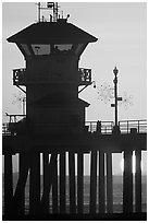 Lifeguard tower on Huntington Pier at sunset. Huntington Beach, Orange County, California, USA ( black and white)