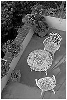 Garden chairs and table seen from above. Laguna Beach, Orange County, California, USA ( black and white)