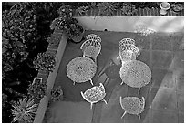 Courtyard with garden chairs and tables. Laguna Beach, Orange County, California, USA (black and white)