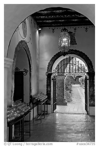 Corridor with candles next to the Serra Chapel. San Juan Capistrano, Orange County, California, USA