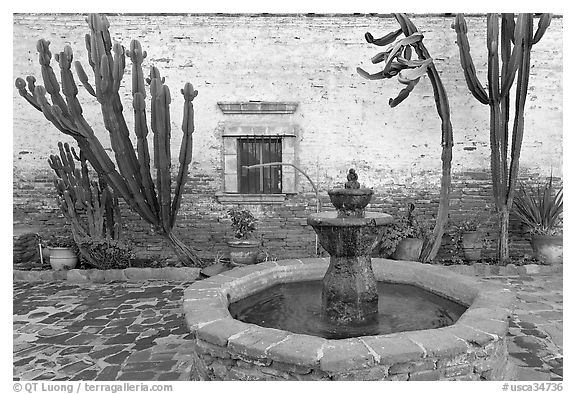 Sacred Garden, with fountain and cacti. San Juan Capistrano, Orange County, California, USA (black and white)