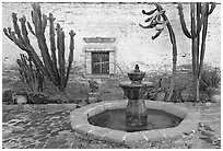 Sacred Garden, with fountain and cacti. San Juan Capistrano, Orange County, California, USA ( black and white)