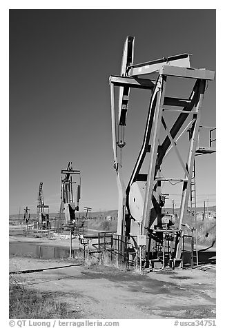 Oil pumping machines, San Ardo Oil Field. California, USA (black and white)