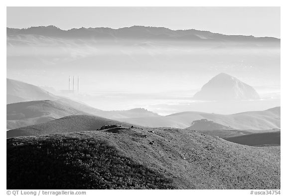 Power plant and Morro Rock seen from hills. California, USA