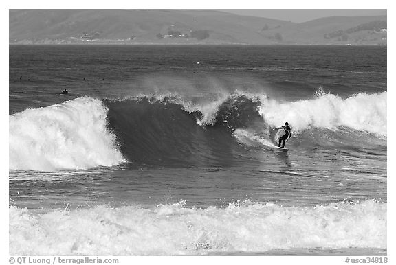 Surfer and wave. Morro Bay, USA (black and white)