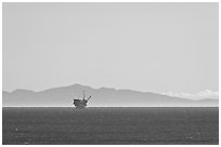 Off-shore oil extraction platform, and Channel Islands. California, USA ( black and white)