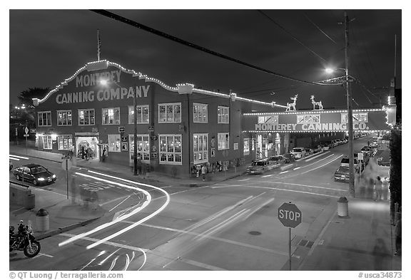 Monterey Canning Company building at night. Monterey, California, USA (black and white)