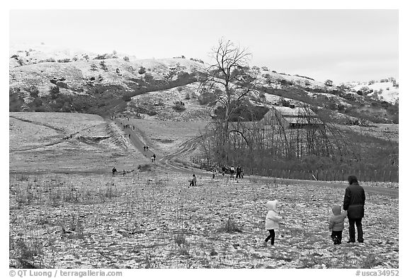 Families visiting Joseph Grant Park after a rare snowfall. San Jose, California, USA (black and white)