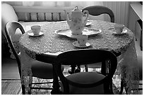 Dining table. Winchester Mystery House, San Jose, California, USA (black and white)