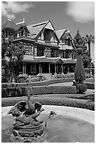 Fountain and facade. Winchester Mystery House, San Jose, California, USA ( black and white)