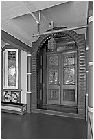 Main entrance doors, always locked. Winchester Mystery House, San Jose, California, USA ( black and white)