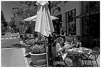 Street and outdoor restaurant tables. Santana Row, San Jose, California, USA ( black and white)
