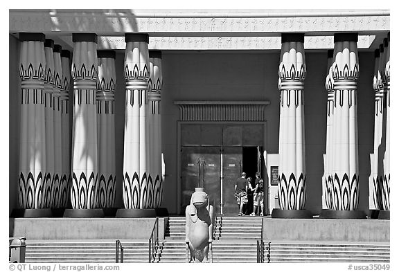 Facade of the  Rosicrucian  Egyptian Museum  with tourists entering. San Jose, California, USA (black and white)
