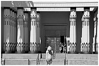Facade of the  Rosicrucian  Egyptian Museum  with tourists entering. San Jose, California, USA ( black and white)
