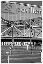 Facade of the HP Pavilion with person walking out. San Jose, California, USA (black and white)