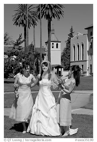 Bride and bridesmaids in front of mission, Santa Clara University. Santa Clara,  California, USA