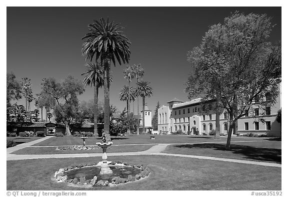 Fountain and gardens near mission, Santa Clara University. Santa Clara,  California, USA (black and white)
