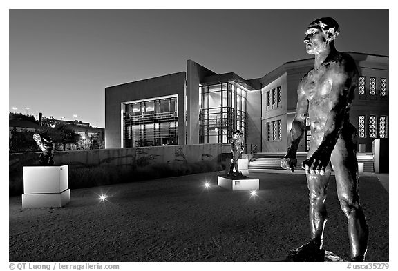 Rodin sculptures and Cantor Art Museum at night. Stanford University, California, USA (black and white)