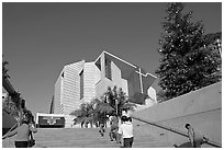 Families climbing stairs towards Cathedral of our Lady of the Angels. Los Angeles, California, USA (black and white)