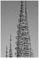 Simon Rodia Watts Towers and moon, late afternoon. Watts, Los Angeles, California, USA (black and white)