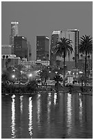 Skyline reflected in a lake in Mc Arthur Park. Los Angeles, California, USA (black and white)