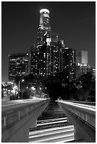 Bridge above Harbor Freeway and US Bank building at night. Los Angeles, California, USA ( black and white)