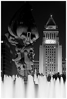 Peace on Earth sculpture, fountain, and City Hall at night. Los Angeles, California, USA (black and white)