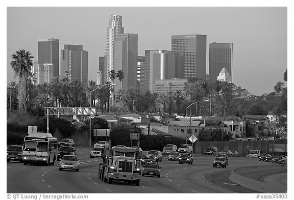 Traffic on freeway and skyline, early morning. Los Angeles, California, USA