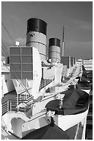 Chimneys, and life rafts aboard the Queen Mary liner. Long Beach, Los Angeles, California, USA (black and white)
