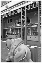 Pink toy elephant and storefront, Chinatown. Los Angeles, California, USA (black and white)