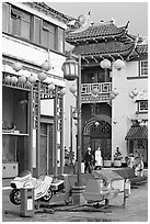 Rides and buildings in Chinese style, Chinatown. Los Angeles, California, USA (black and white)