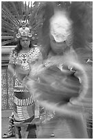 Aztec dancers in motion,  El Pueblo historic district. Los Angeles, California, USA ( black and white)